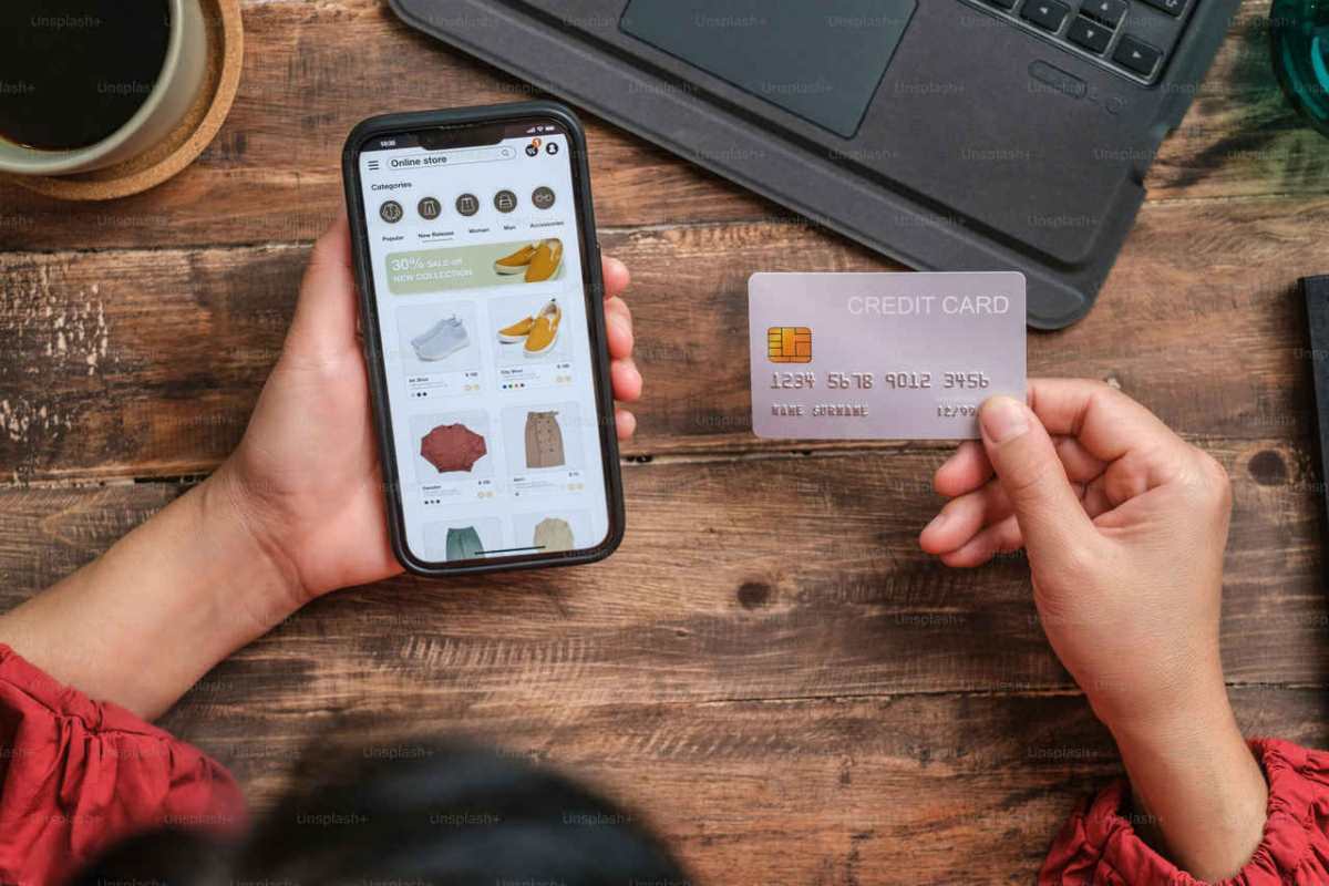 close-up-woman-hand-using-credit-card-shopping-online-on-mob1.jpg